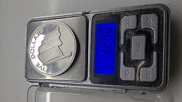 Искусство и коллекционирование: Продаю серебряную монету в капсуле. 5 долларов Богамские острова — 3