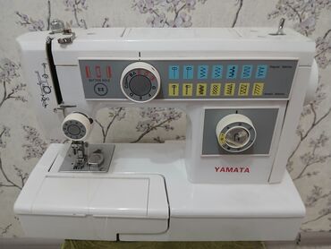 тигүүчү машинка: Тигүүчү машина