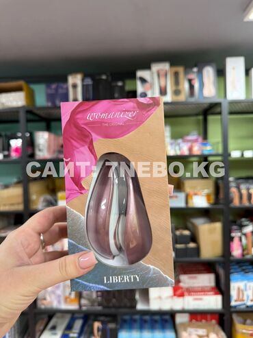 Товары для взрослых: Розовый Womanizer Liberty - стильный и мощный вакуумно-волновой