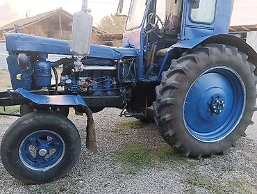 Kommersiya nəqliyyat vasitələri: Mavi rəngdə tək kabinəli təkərli traktor. Texniki xüsusiyyətlər və — 4