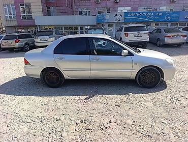 e34 2 5: Mitsubishi Lancer: 2002 г., 1.6 л, Автомат, Газ, Седан — 4