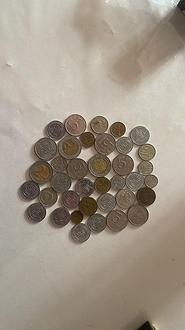 pul kolleksiya: Müxtəlif ölkələrə aid xırda sikkələr toplusu - Toplu şəkillərdə — 1