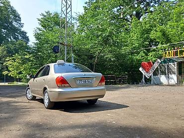 16 tekerler: Nissan Sunny: 1.3 l | 2007 il Sedan — 3