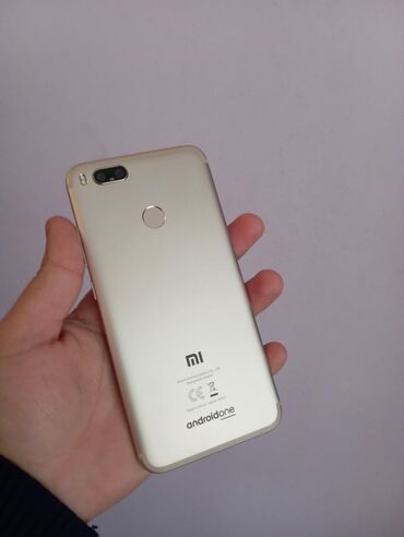 Xiaomi: Xiaomi Mi A1, 64 GB, rəng - Gümüşü, 
 Düyməli, Barmaq izi, İki sim kartlı