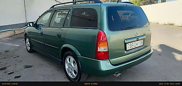 Opel: Opel Astra karvan (universal) – yaşıl rəng - Kuzov: universal, dam — 8