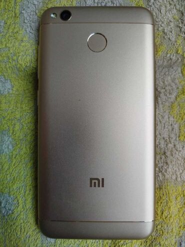 телефон за 100: Redmi, Redmi 4X, цвет - Золотой, 1 SIM, 2 SIM