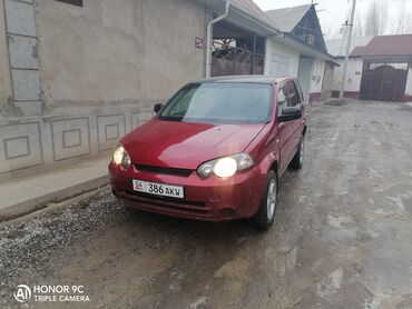 хендай портер автомат: Компактный городской хэтчбек красного цвета. Основные особенности: -