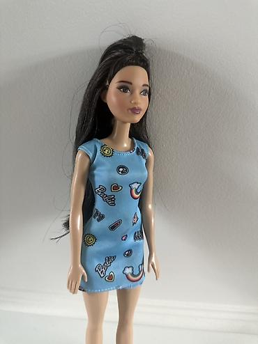 igračka dumpling: Barbie lutka sa dugom tamnom kosom i modernom mini haljinom. Uz lutku — 1