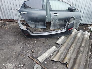 Бампер и комплектующие: Бампер Kia — 1