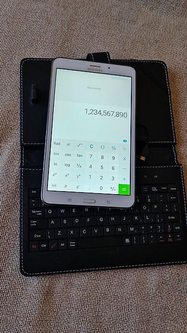 Tableti: Samsung Galaxy Tab 4 7.0 sa futrolom i mini tastaturom - Model — 14