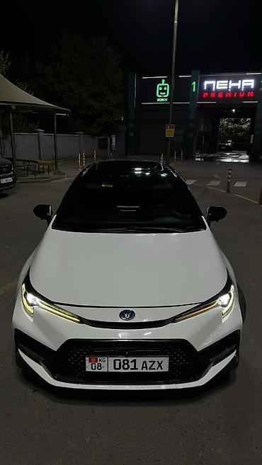 покрышки на 12: Toyota Corolla: 2022 г., 1.8 л, Гибрид, Седан — 2