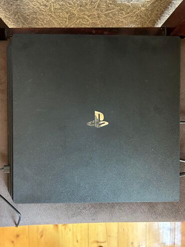 PS4 (Sony Playstation 4): Ps4 Pro proşifkalı 6 ədəd cd və orginal pultla