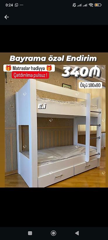 İki mərtəbəli çarpayı – ağ rəngdə, kompakt və funksional model. -