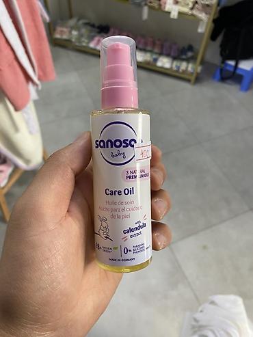 Детская гигиена и уход: Sanosa Baby Care Oil с экстрактом календулы - Уходовое масло для — 1