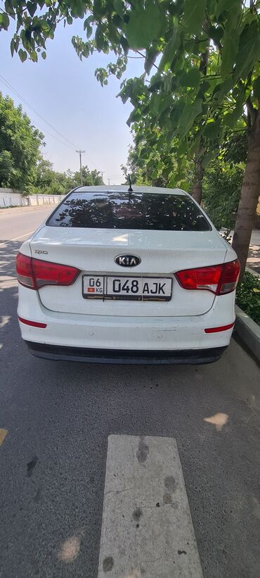 кредит на машину: Kia Rio: 2016 г., 1.6 л, Автомат, Бензин, Седан
