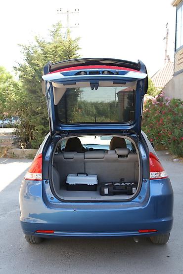 Honda: Honda Insight Hybrid, mavi rəng, 5 qapılı liftbek gövdə. Əsas — 6