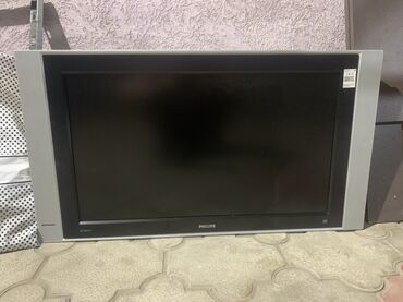 плазменные телевизоры: Телевизор Philips с плоским экраном и широкой рамкой серебристого