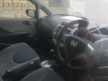 унаа тетиктери: Honda Fit: 2006 г., 1.3 л, Автомат, Бензин, Хетчбек — 1