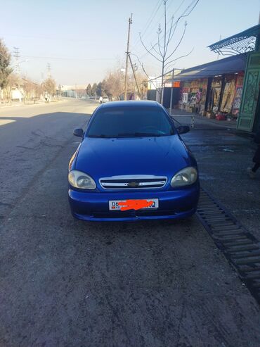 Другие автомобили: Седан синего цвета, компактный и экономичный. Кузов 4‑дверный — 8