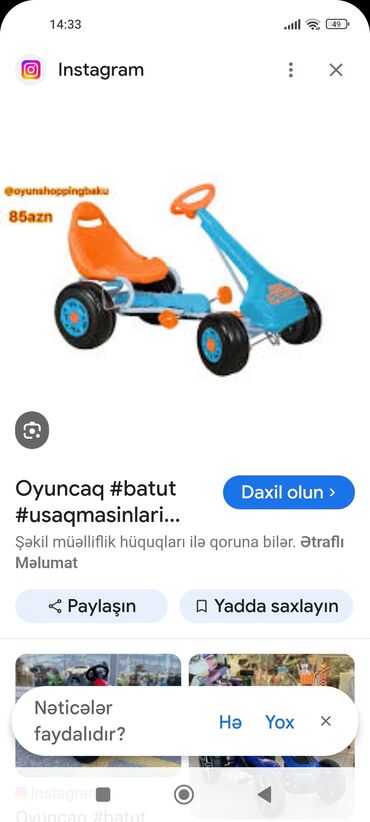 ağ uşaq krosovkaları: Mavi rəngdə, narıncı oturacağı olan uşaq velosipedi. Pedalları və