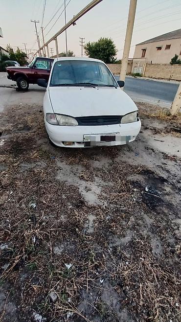 04 maşın: Kia Avella: 1.3 l | 1997 il Hetçbek — 1