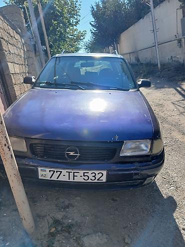 opel astra dinamo: Opel Astra F Caravan (universal), tünd mavi rəng. - Kuzov: 5 qapı — 2