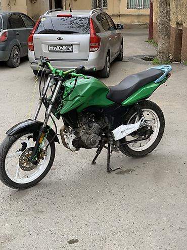 motosiklet harley davidson: Motosiklet – küçə/naked üslubunda, yaşıl-qara rəng sxemi ilə. Texniki — 1