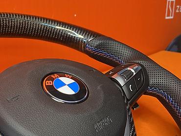 Рули: Спортивный руль BMW в стиле M Performance с выразительным карбоновым — 13