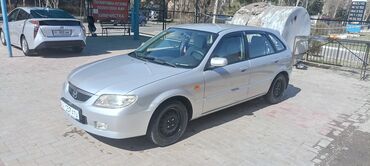 Mazda: Mazda 323: 2003 г., 1.6 л, Механика, Бензин, Хэтчбэк