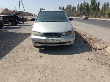 машины на обмен: Honda Odyssey (первое поколение), правый руль, серебристый минивэн