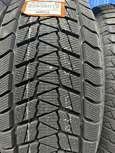 Шины: Зимняя шина GOFORM FrozenPro размером 235/55 R19. Характеристики: - — 2