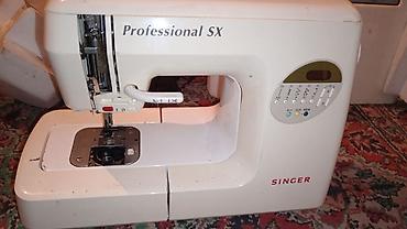 komputer noutbuk: Məhsul: Singer Professional SX tikiş maşını Xüsusiyyətlər: - Brend — 1