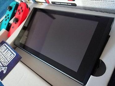 Nintendo Switch: 🔥 JEDINSTVENA PONUDA! Prodajem Nintendo Switch 32GB + microSD 400GB — 4