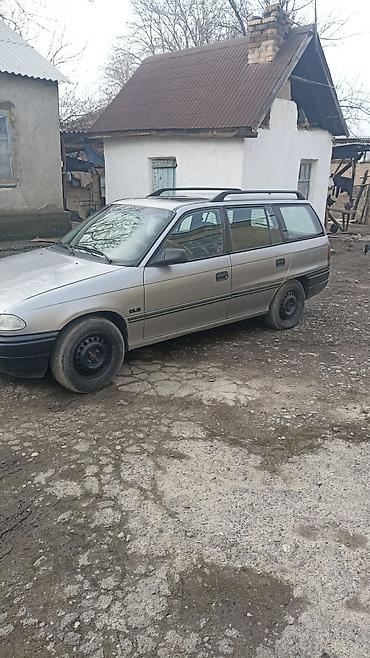 ош е34: Opel Astra: 1994 г., Кол менен иштөөчү, Универсал — 4
