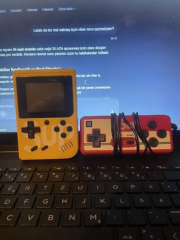 irşad 13 pro max: Retro əl oyun konsolu – “SUP” portativ oyun aparatı Xüsusiyyətlər: - — 1