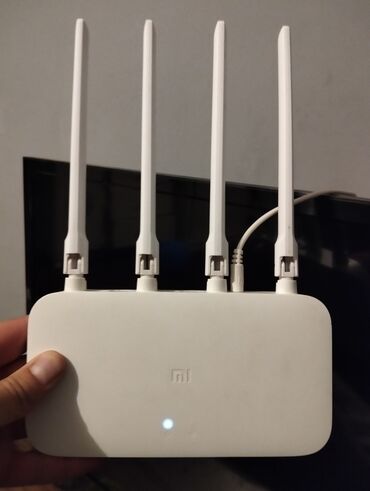 Noutbuk və netbuklar: Xiaomi 4a router 2.4 ghz 5 ghz var çox güclü routerdir şifrəsini