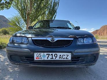 385 55: Mazda 626: 1997 г., 1.8 л, Механика, Газ, Седан — 1
