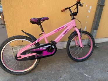 bundu roze boje: Prodajem deciji bicikl za uzrast od 5-9 godina. Kupljen prosle godine