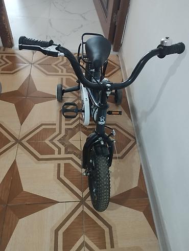velo 28: Uşaq velosipedi – “Медвежонок” BMX üslubunda Xüsusiyyətlər: - Təkər — 2