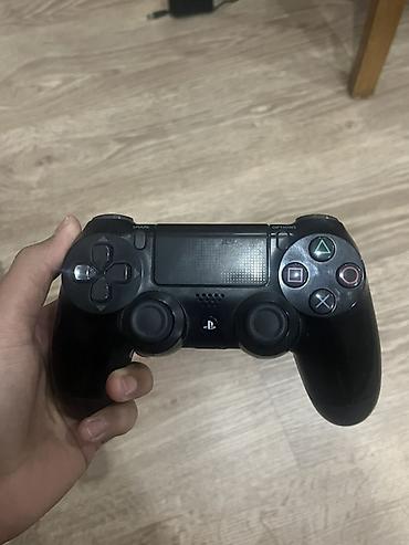 Беспроводной геймпад Sony DualShock 4 (PS4), цвет черный