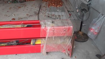 Avtoservis avadanlıqları: Euromax avtomobil qaldıranı (hidravlik, iki postlu tip). Qırmızı metal — 2