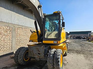 Экскаваторы: Экскаватор, Volvo, 2000 г., Колесный — 2