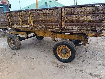 Lapetlər: Məhsul: 2-oxlu kənd təsərrüfatı qoşqusu Təsvir: - Traktorla qoşulmaya — 2