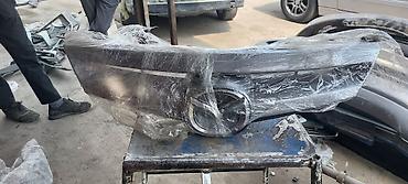 Решетки радиатора: Решетка радиатора Mazda Оригинал — 8