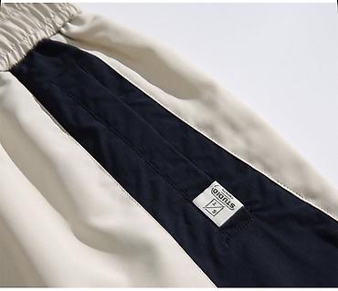 Айымдардын кийими: Спортивные штаны Ellesse - Модель: свободного кроя, джоггеры. - — 2