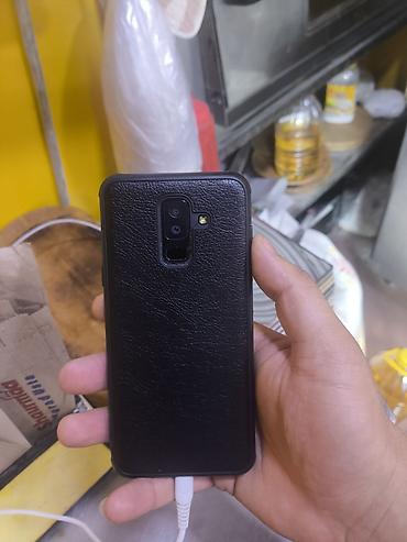 samsung ue50nu7097uxru: Samsung Galaxy A6 Plus, 32 GB, rəng - Qara, İki sim kartlı — 3
