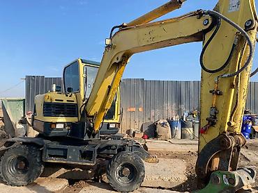 Экскаваторы: Экскаватор, 2010 г., Колесный — 6