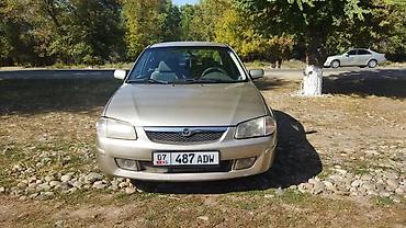 Mazda 323: 1998 г., Механика, Бензин, Седан