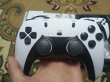 quest 3s: Игровая приставка Game Stick Pro 4K с двумя беспроводными геймпадами — 1