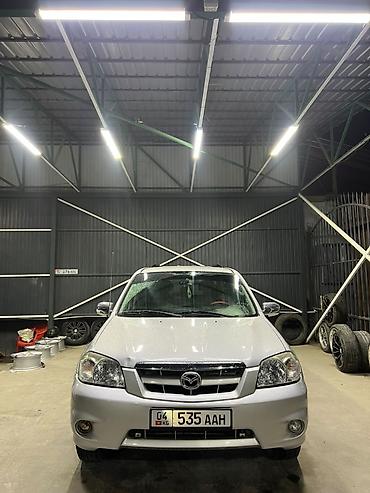 производитель ключей: Mazda Tribute: 2005 г., 2 л, Механика, Бензин, Внедорожник — 7